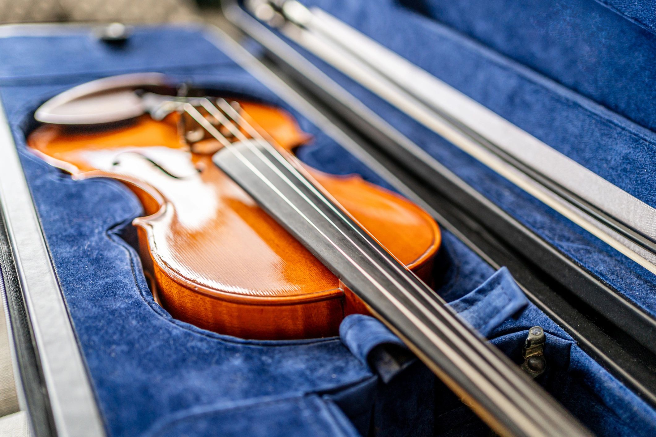 Classical violin in an open case